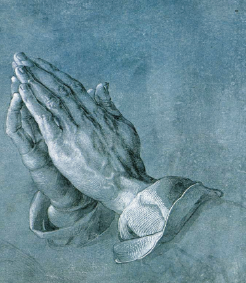 A close-up of a praying hands Description automatically generated